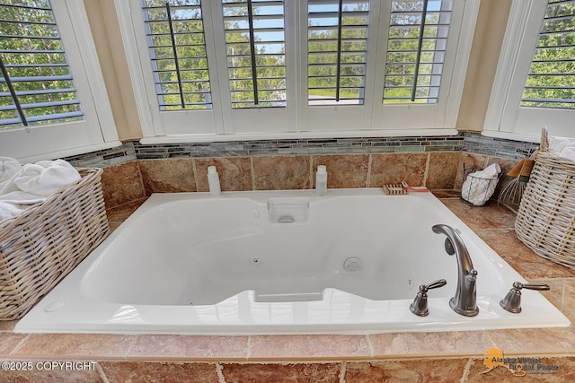 2548 S Gallop Cir, Wasilla, AK 99654 - bathroom featuring a whirlpool tub