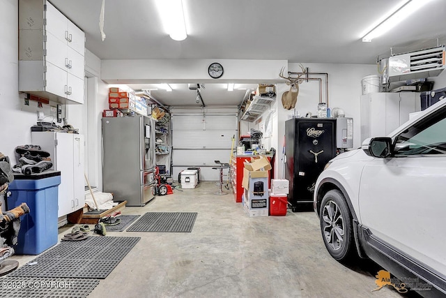 2548 S Gallop Cir, Wasilla, AK 99654 - garage with stainless steel refrigerator with ice dispenser