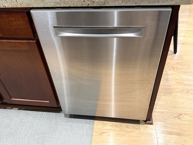 14740 Maxwell Pl, Anchorage, AK 99516 - kitchen view of dishwasher and dark brown cabinets
