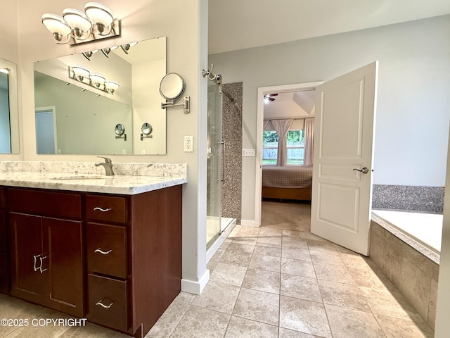 14740 Maxwell Pl, Anchorage, AK 99516 - bathroom featuring a shower stall, vanity, tiled tub, and tile patterned flooring