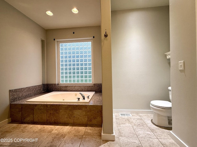 14740 Maxwell Pl, Anchorage, AK 99516 - bathroom featuring toilet, a whirlpool tub, baseboards, recessed lighting, and tile patterned flooring