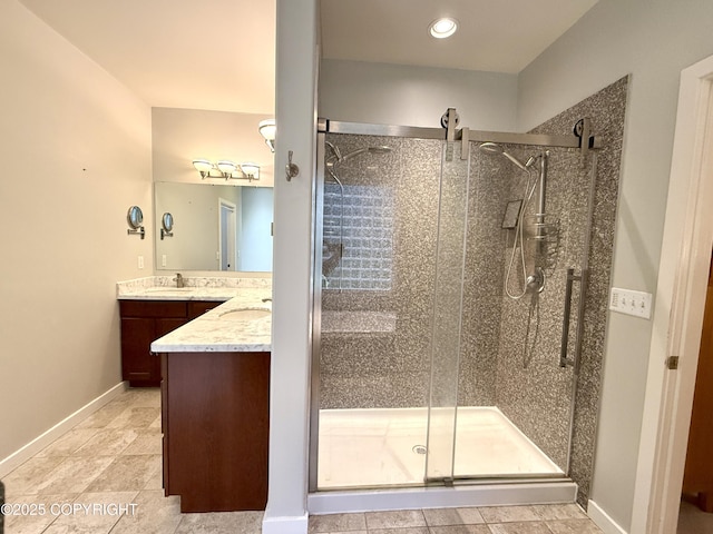 14740 Maxwell Pl, Anchorage, AK 99516 - full bath featuring double vanity, a shower stall, baseboards, tile patterned floors, and recessed lighting
