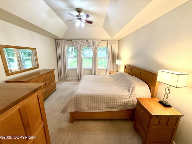14740 Maxwell Pl, Anchorage, AK 99516 - bedroom with light colored carpet, multiple windows, vaulted ceiling, and ceiling fan