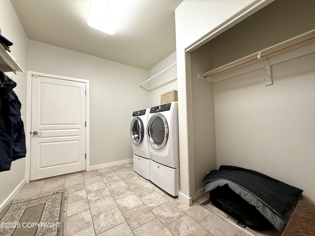 14740 Maxwell Pl, Anchorage, AK 99516 - laundry area featuring separate washer and dryer and baseboards