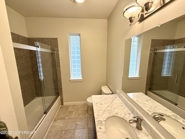 14740 Maxwell Pl, Anchorage, AK 99516 - bathroom with combined bath / shower with glass door, toilet, vanity, baseboards, and tile patterned flooring