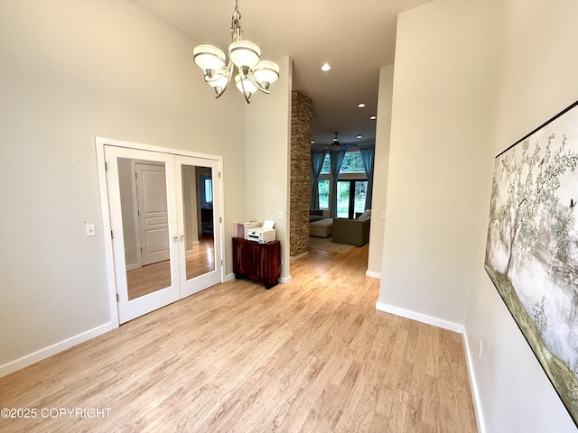14740 Maxwell Pl, Anchorage, AK 99516 - spare room with a chandelier, baseboards, light wood finished floors, french doors, and recessed lighting