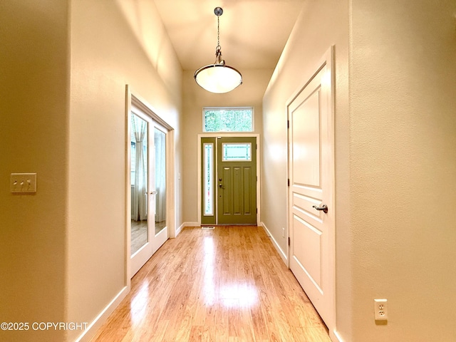 14740 Maxwell Pl, Anchorage, AK 99516 - foyer with light wood finished floors and baseboards