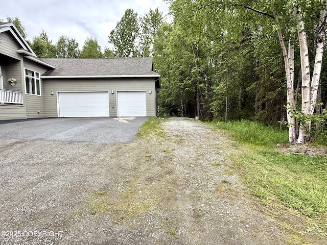 14740 Maxwell Pl, Anchorage, AK 99516 - garage with asphalt driveway