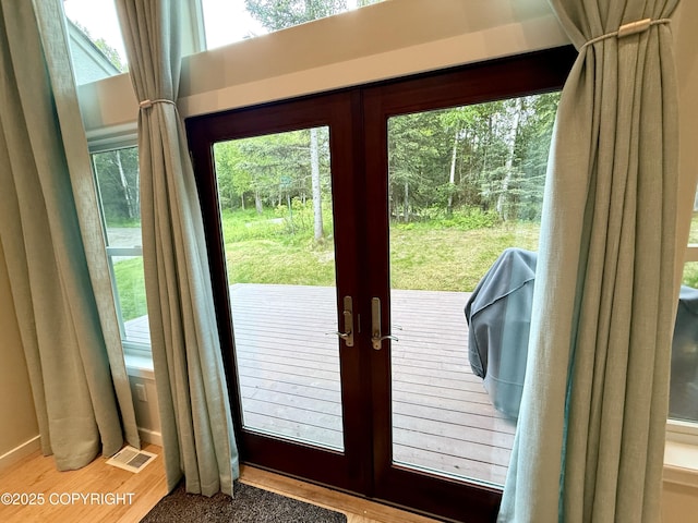 14740 Maxwell Pl, Anchorage, AK 99516 - entryway with french doors and wood finished floors