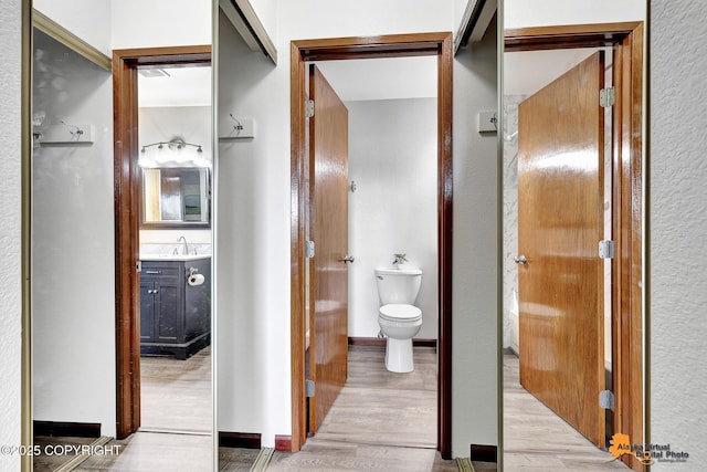 4221 Folker St # F203, Anchorage, AK 99508 - bathroom with vanity and wood finished floors