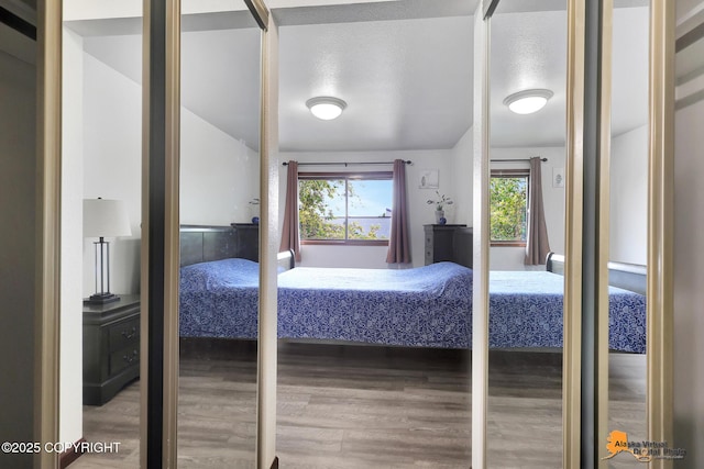 4221 Folker St # F203, Anchorage, AK 99508 - bedroom featuring wood finished floors