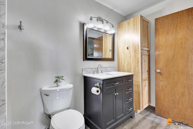 4221 Folker St # F203, Anchorage, AK 99508 - bathroom with vanity and wood finished floors
