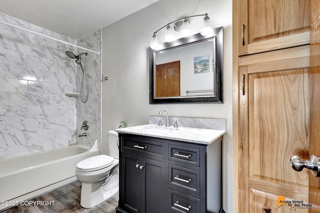 4221 Folker St # F203, Anchorage, AK 99508 - bathroom with shower / bath combination, vanity, and wood finished floors