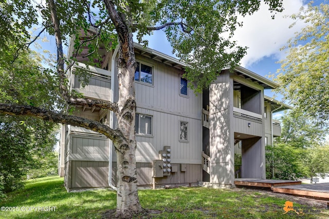 4221 Folker St # F203, Anchorage, AK 99508 - back of house featuring a balcony