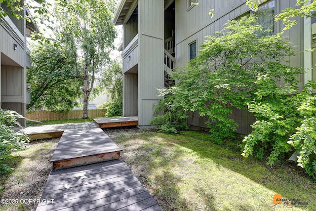 4221 Folker St # F203, Anchorage, AK 99508 - view of yard featuring a wooden deck