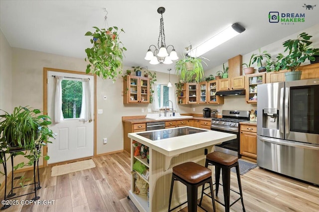 8520 E Gold Bullion Blvd, Palmer, AK 99645 - kitchen featuring appliances with stainless steel finishes, under cabinet range hood, open shelves, a center island, and vaulted ceiling