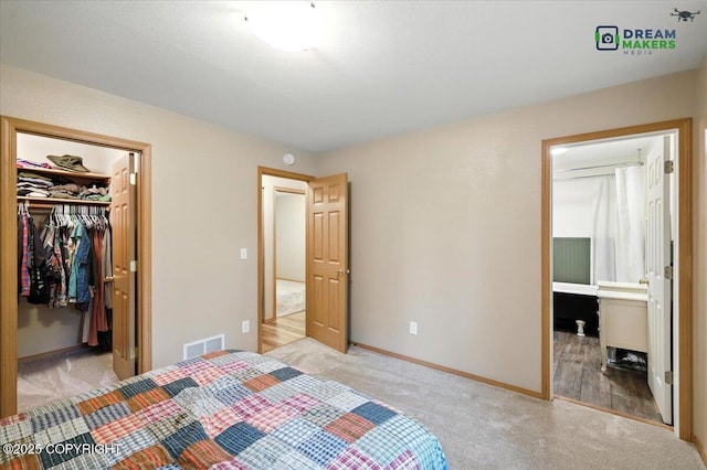 8520 E Gold Bullion Blvd, Palmer, AK 99645 - carpeted bedroom with a spacious closet and ensuite bathroom