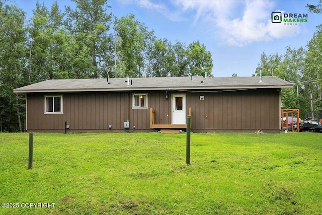 8520 E Gold Bullion Blvd, Palmer, AK 99645 - rear view of property with a yard and board and batten siding