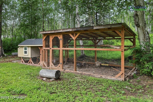 8520 E Gold Bullion Blvd, Palmer, AK 99645 - surrounding community with exterior structure and an outdoor structure