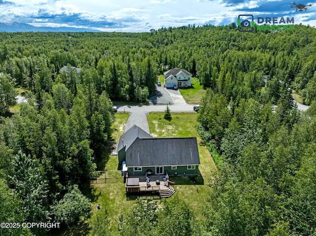 3111 N Intuition Dr, Wasilla, AK 99654 - aerial view of property and surrounding area featuring a heavily wooded area