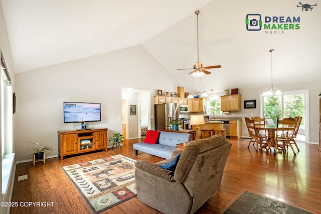 3111 N Intuition Dr, Wasilla, AK 99654 - living room with high vaulted ceiling, wood finished floors, and ceiling fan