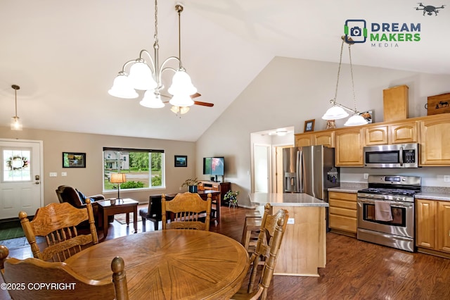 3111 N Intuition Dr, Wasilla, AK 99654 - dining space with a chandelier, high vaulted ceiling, and dark wood finished floors