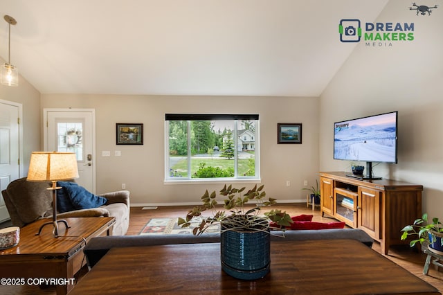 3111 N Intuition Dr, Wasilla, AK 99654 - living area featuring vaulted ceiling and wood finished floors