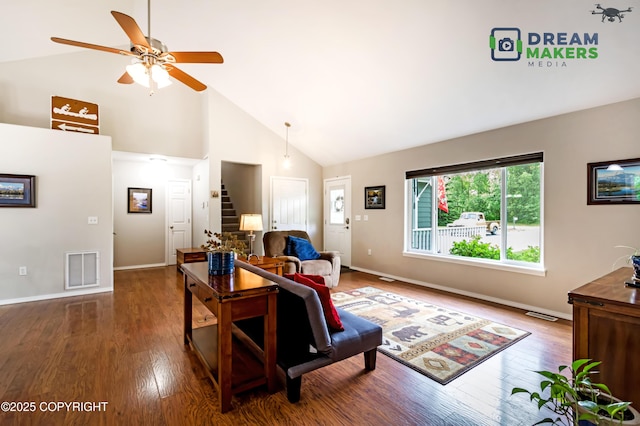3111 N Intuition Dr, Wasilla, AK 99654 - living room with high vaulted ceiling, a ceiling fan, wood finished floors, and stairway