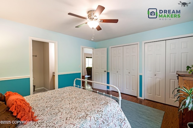 3111 N Intuition Dr, Wasilla, AK 99654 - bedroom featuring multiple closets, wood finished floors, and a ceiling fan