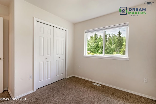 3111 N Intuition Dr, Wasilla, AK 99654 - unfurnished bedroom featuring carpet flooring and a closet