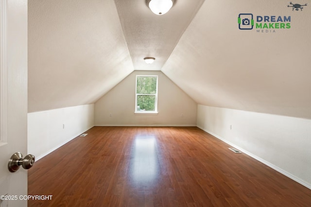 3111 N Intuition Dr, Wasilla, AK 99654 - additional living space with wood finished floors and lofted ceiling