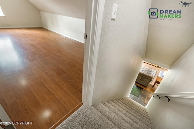 3111 N Intuition Dr, Wasilla, AK 99654 - stairs featuring lofted ceiling and wood finished floors