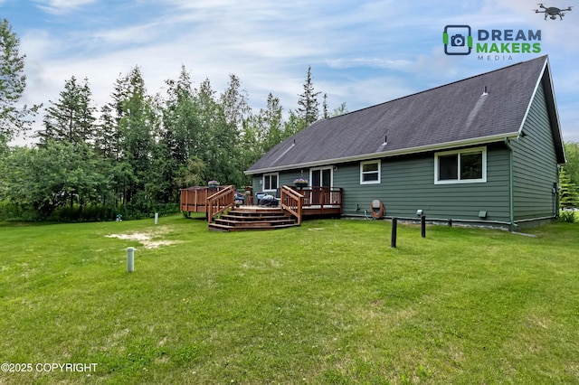 3111 N Intuition Dr, Wasilla, AK 99654 - rear view of house with a yard, a wooden deck, and roof with shingles