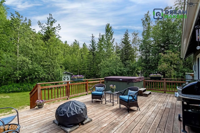 3111 N Intuition Dr, Wasilla, AK 99654 - deck with a hot tub, a storage shed, a lawn, and a grill