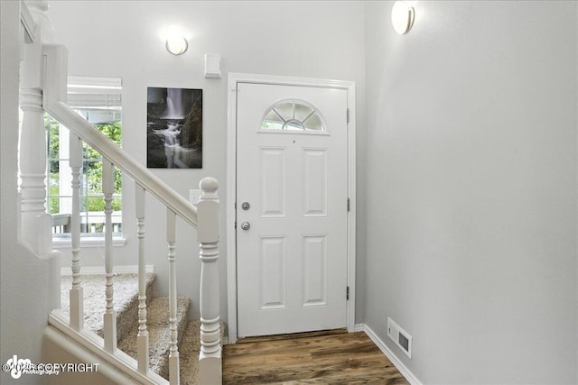9198 Eagle River Ln, Eagle River, AK 99577 - entryway with healthy amount of natural light, wood finished floors, and stairs