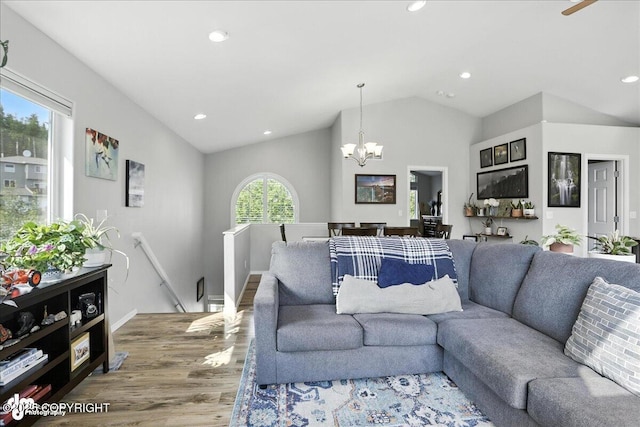 9198 Eagle River Ln, Eagle River, AK 99577 - living room with a chandelier, wood finished floors, vaulted ceiling, and recessed lighting
