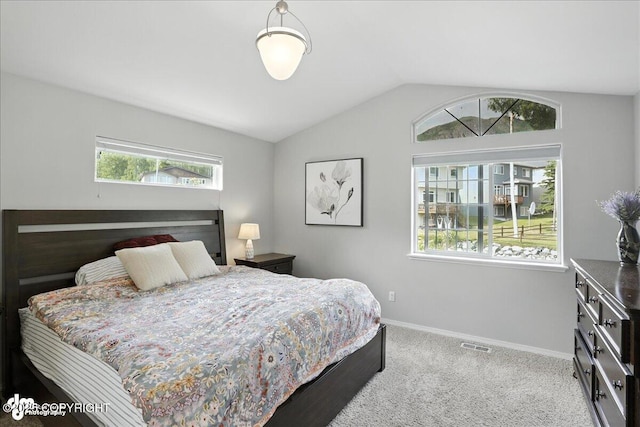 9198 Eagle River Ln, Eagle River, AK 99577 - carpeted bedroom with lofted ceiling and baseboards