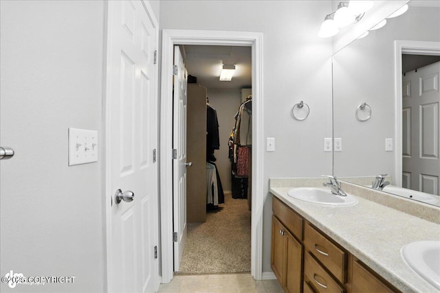 9198 Eagle River Ln, Eagle River, AK 99577 - bathroom with double vanity and a spacious closet