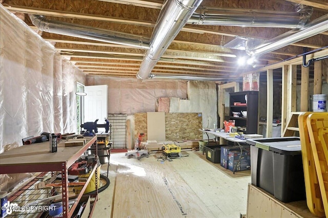 9198 Eagle River Ln, Eagle River, AK 99577 - unfinished basement featuring wood finished floors