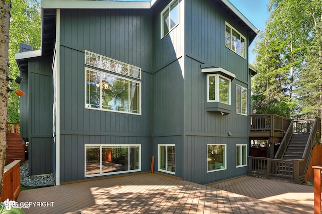 17001 Yellowstone Dr, Eagle River, AK 99577 - rear view of property featuring stairs and a deck