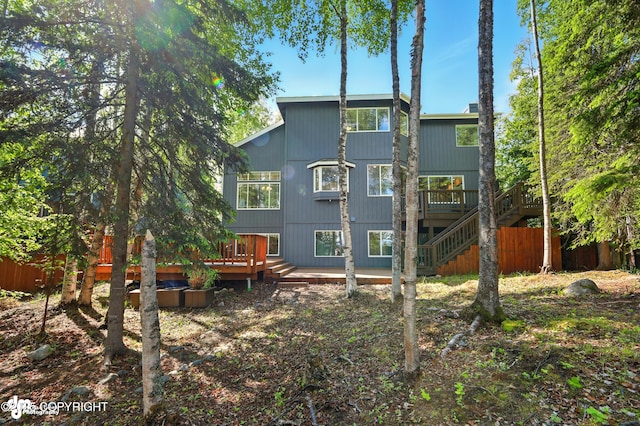 17001 Yellowstone Dr, Eagle River, AK 99577 - rear view of house featuring a deck and stairway