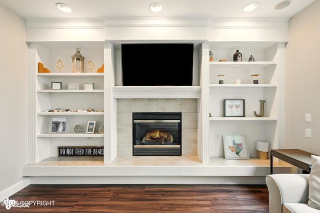 17001 Yellowstone Dr, Eagle River, AK 99577 - living area featuring wood finished floors, crown molding, and a fireplace