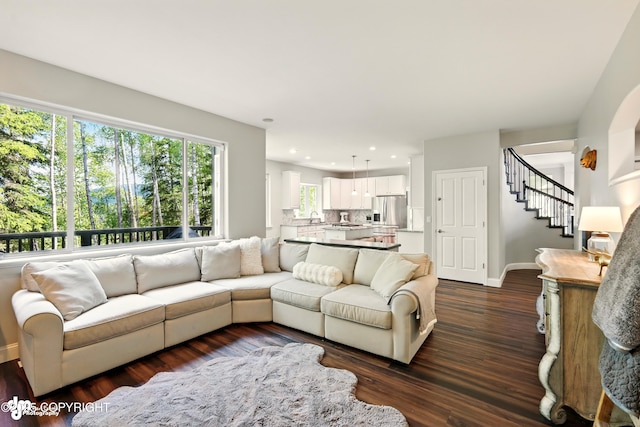 17001 Yellowstone Dr, Eagle River, AK 99577 - living room with stairs, dark wood finished floors, and recessed lighting