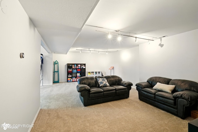 17001 Yellowstone Dr, Eagle River, AK 99577 - carpeted living area featuring baseboards and track lighting