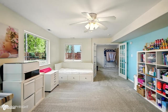17001 Yellowstone Dr, Eagle River, AK 99577 - bedroom with light carpet and a ceiling fan