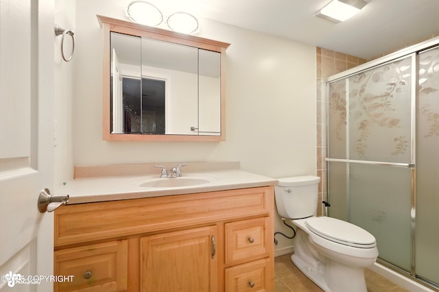 17001 Yellowstone Dr, Eagle River, AK 99577 - full bathroom with vanity, a stall shower, and tile patterned floors