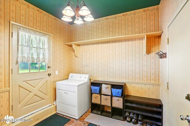 19807 First St, Eagle River, AK 99577 - laundry room with washer / dryer, wallpapered walls, a chandelier, and tile patterned floors