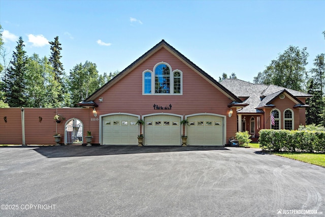 2215 S Austin Cir, Palmer, AK 99645 - view of front of home with driveway and a garage