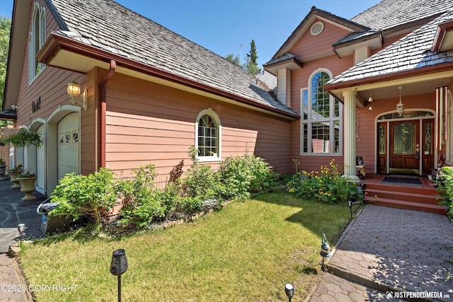 2215 S Austin Cir, Palmer, AK 99645 - doorway to property featuring a lawn