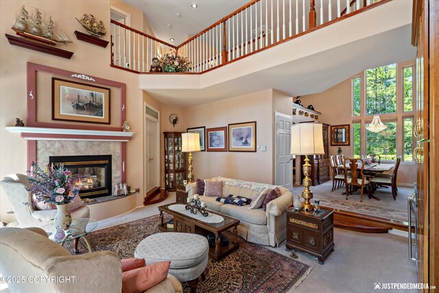 2215 S Austin Cir, Palmer, AK 99645 - carpeted living area featuring high vaulted ceiling and a premium fireplace